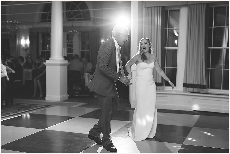 Fun, Candid black and white photo of a bride dancing with her dad at the Equinox Luxury Resort. 