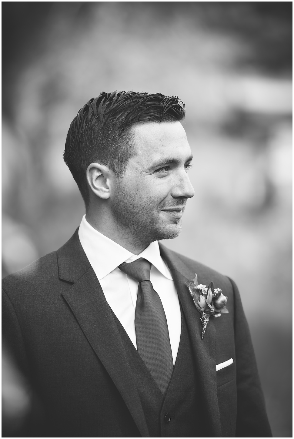 Candid Black and White groom portrait. 