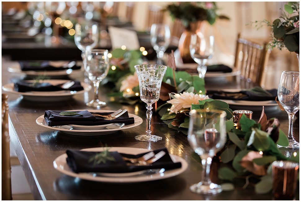 Detail photo of wedding reception farm table style. 