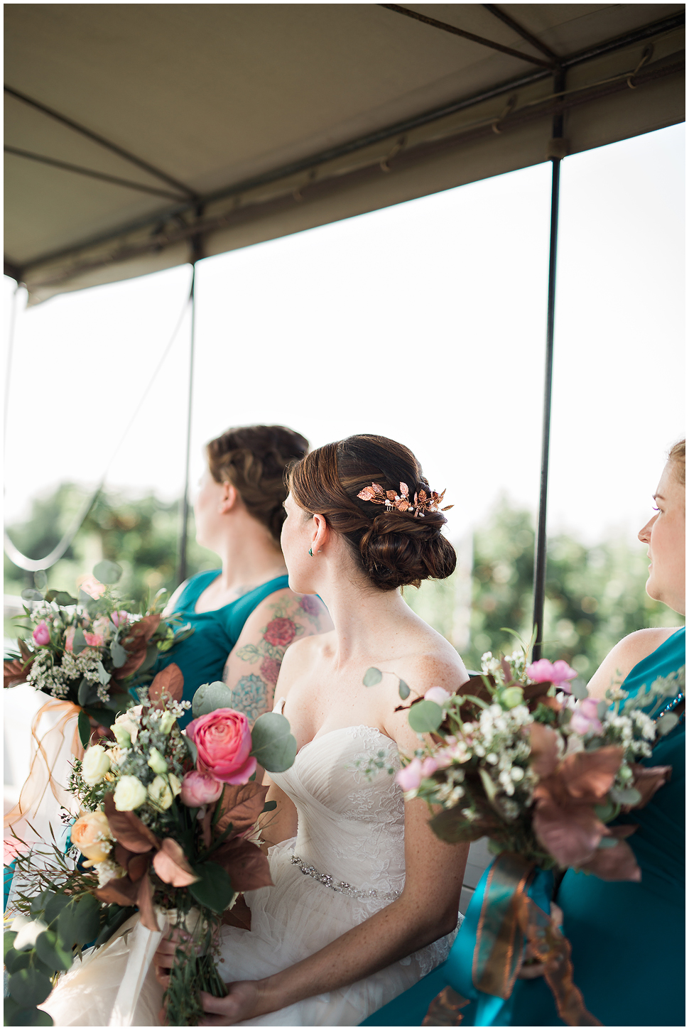 Candid photo of bride and bridesmaids at Alyson's Orchard in Walpole. 