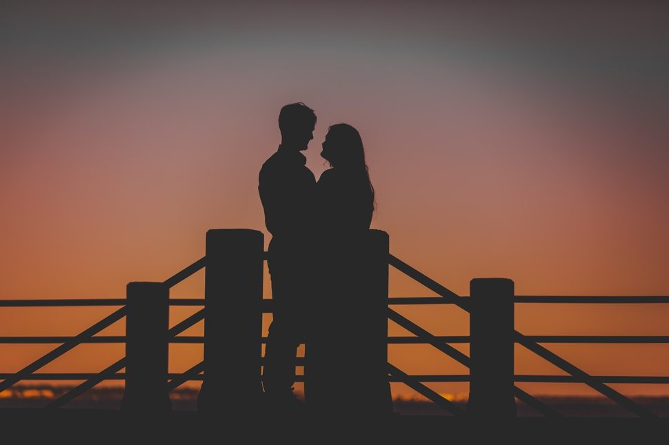 Silhouette photo of a Charleston Engagement Session at Dusk. 