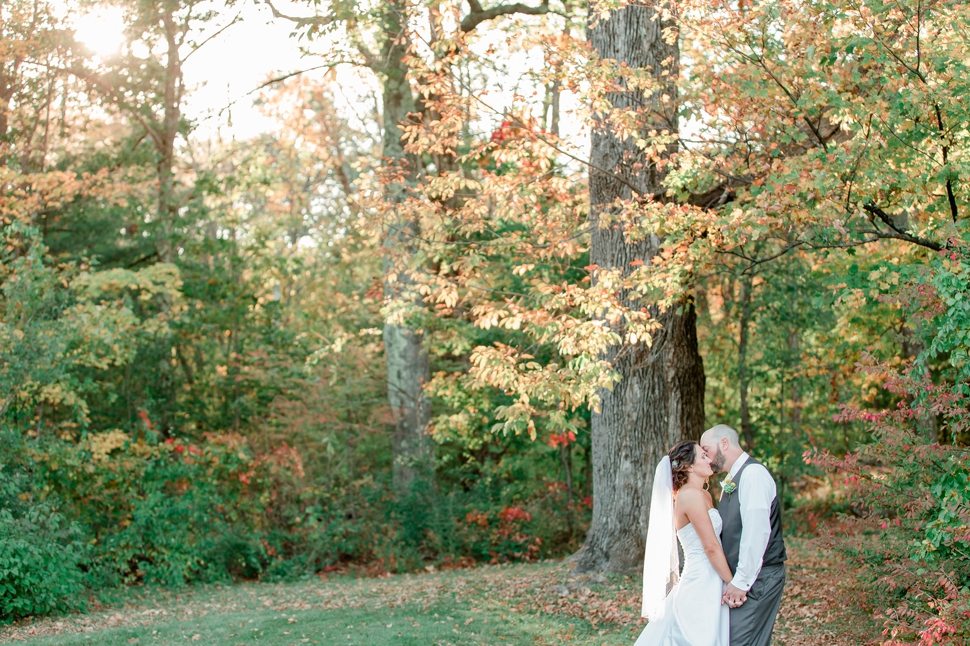 informal, relaxed and unposed bride and groom portrait in the grounds of Grand View Inn Resort during fall