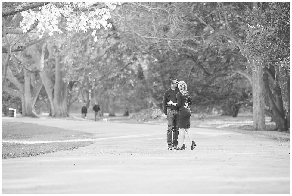 Black and White Candid photo of an engaged couple at the Arboretum in Boston.  