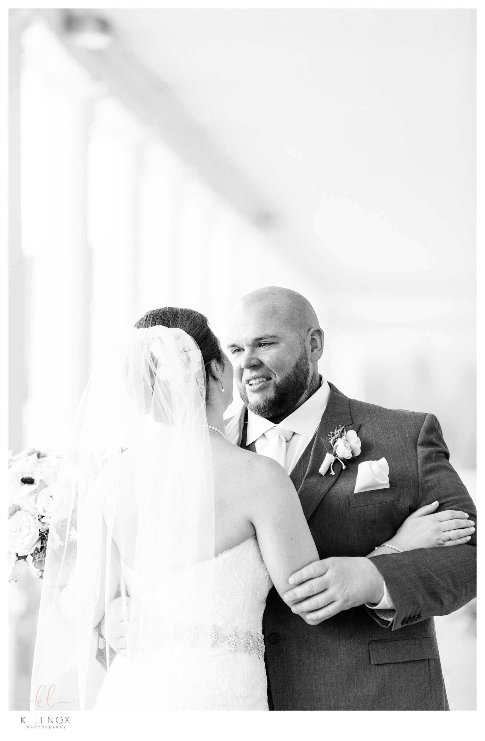 Black and White image of showing a bride and groom for their Omni mount washington resort wedding