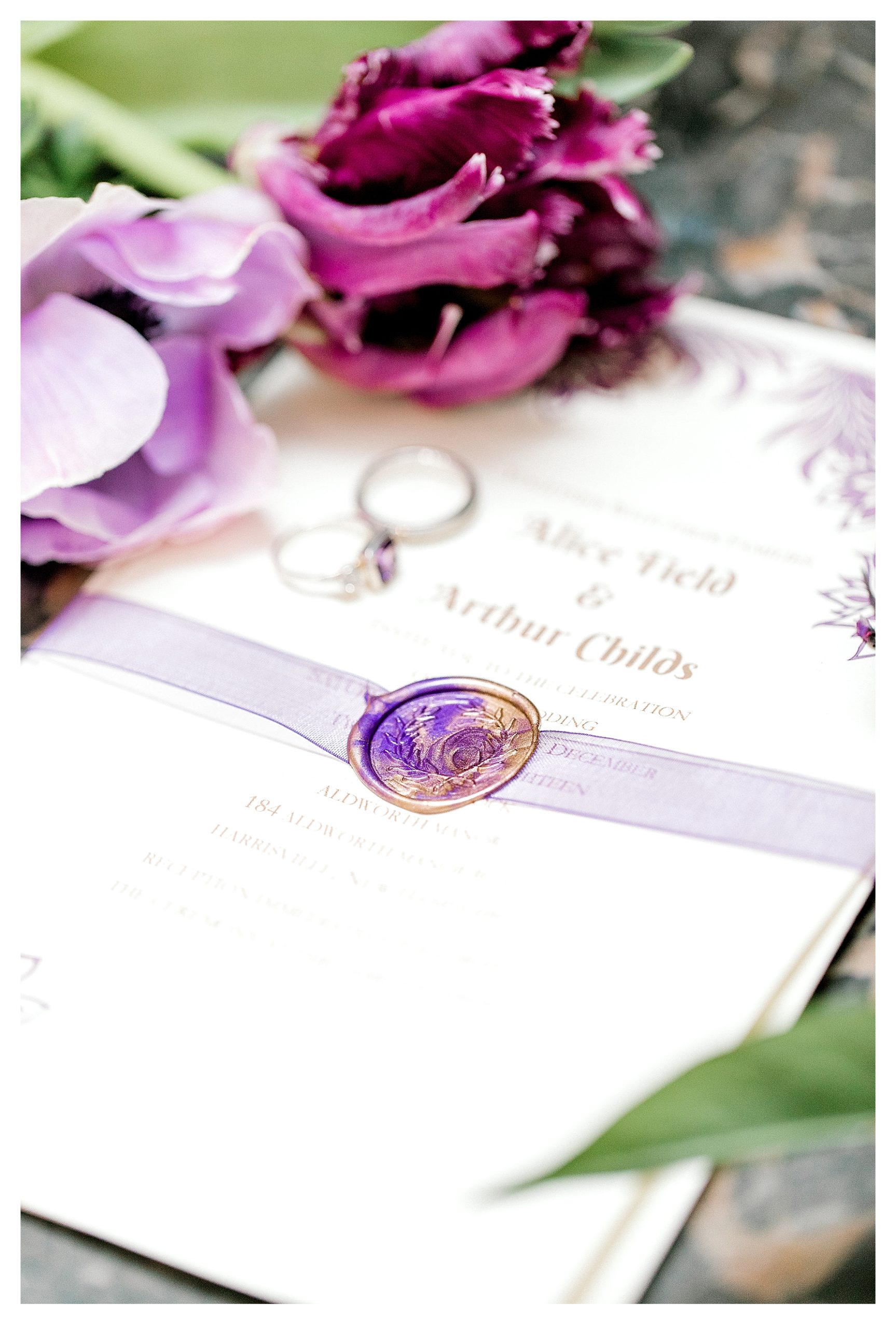 Simple and Elegant White inivation with purple and gold wax seal for a Wedding at Aldworth Manor