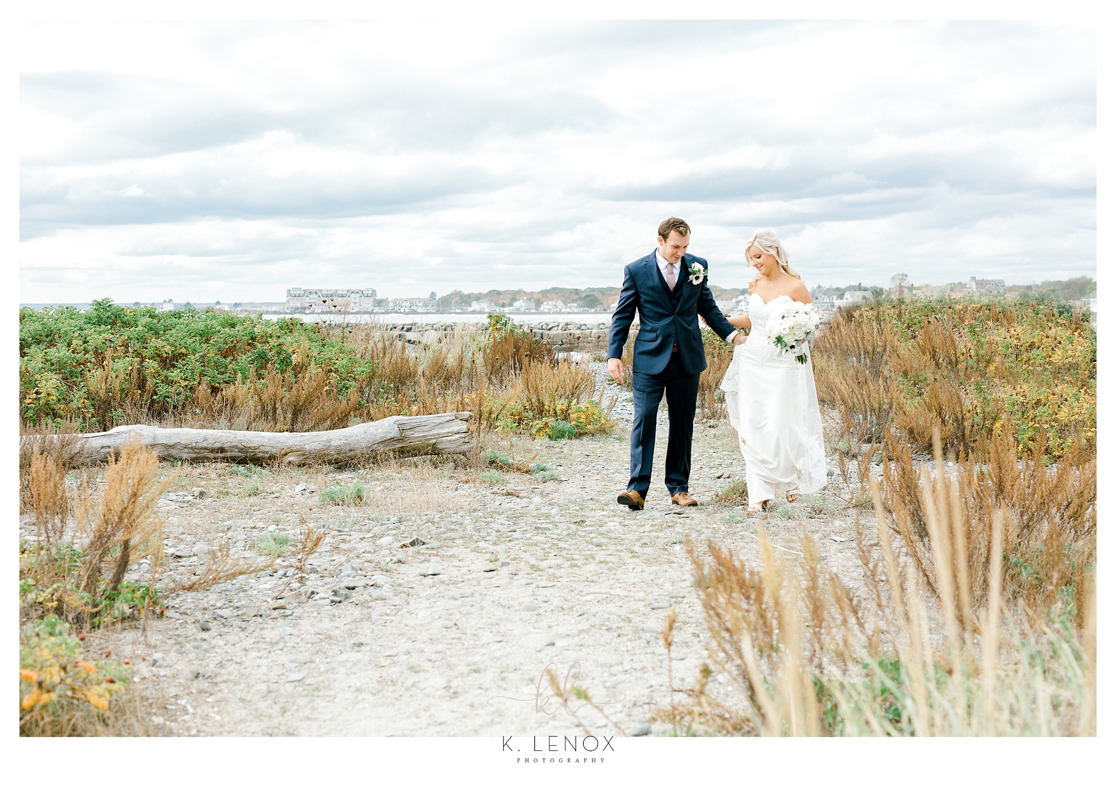 Bride and Groom walk on the Beach in Kennebunkport Maine