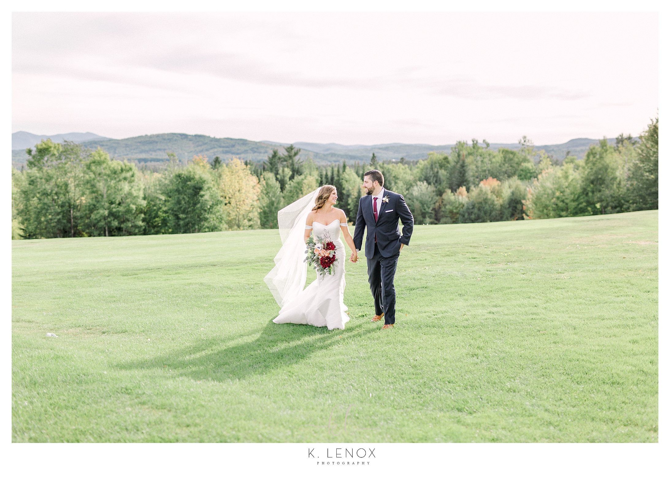 Bride and Groom walk hand in hand at the Mountain View Grand resort in Northern NH.