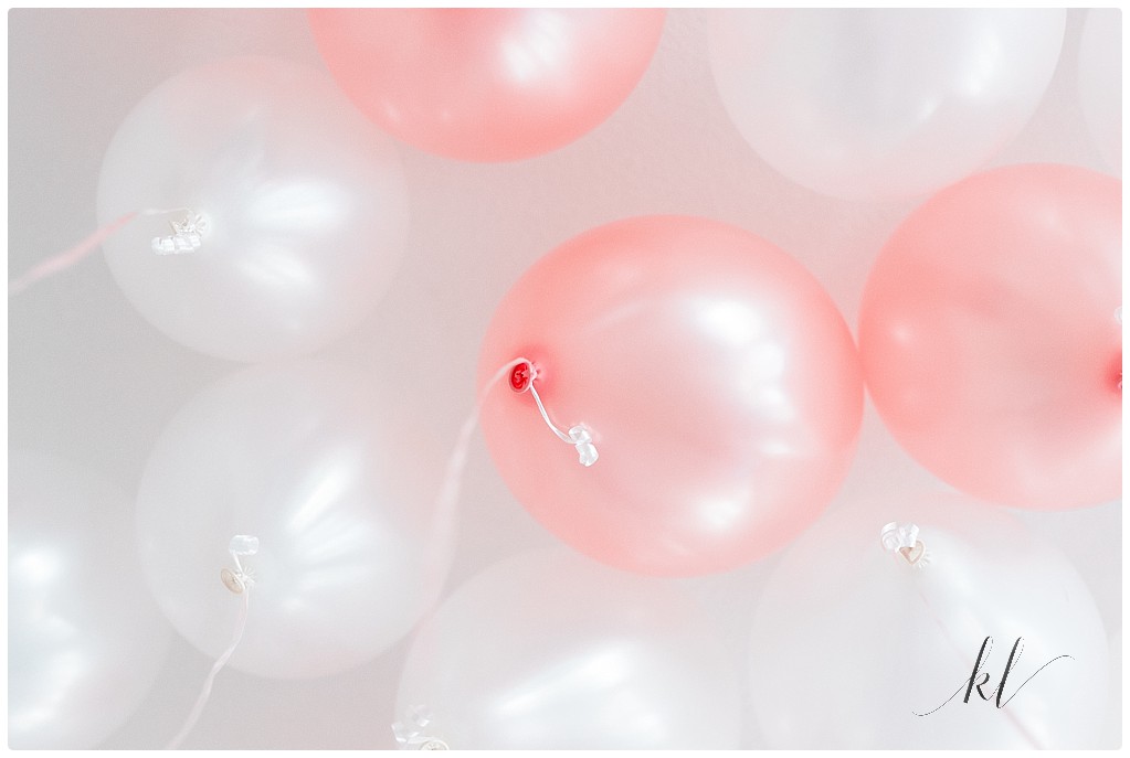 Pink and White Balloons adorned the reception area at the Riverside Hotel