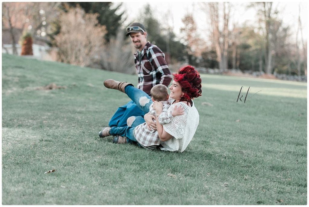 Fun Family Photos- little boy tackling his mom laughing. 