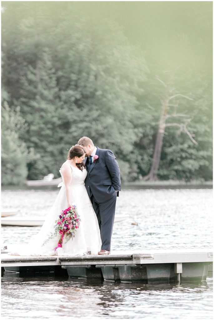 Candid and Natural bride and Groom portrait on the dock at Beach Lake PA. 