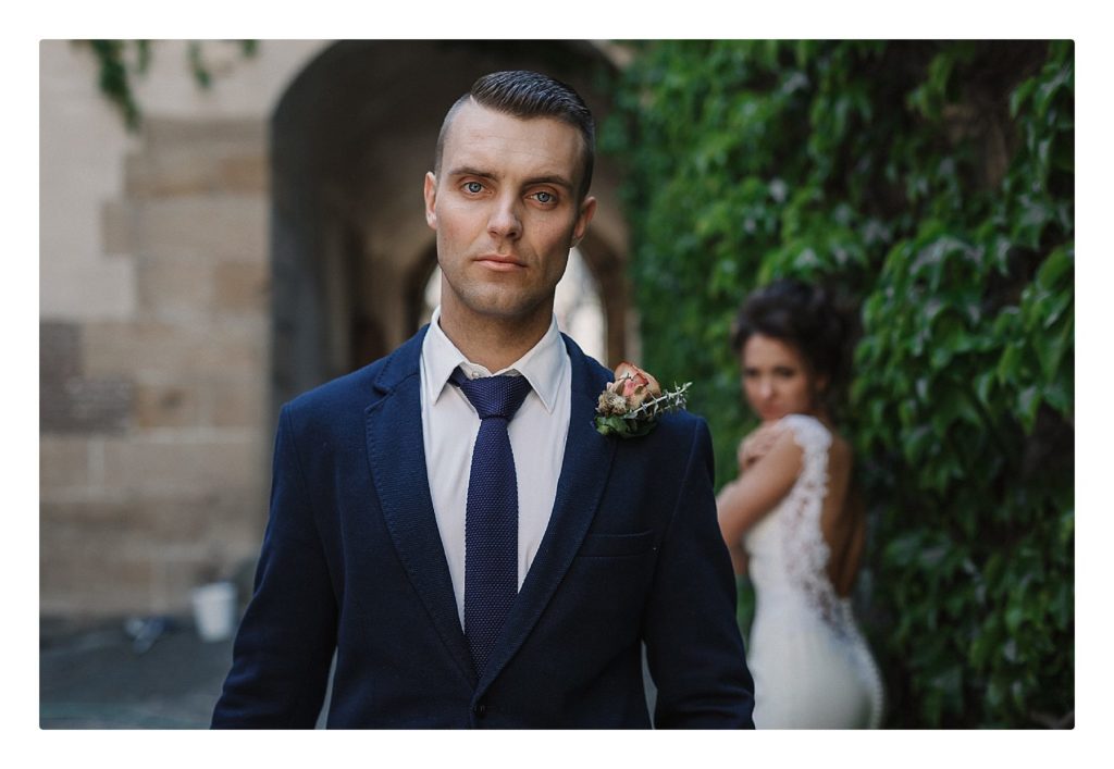 Fashion Tips for the Clueless Groom- Consider Lapel Width. Groom modeling a high end suit. 