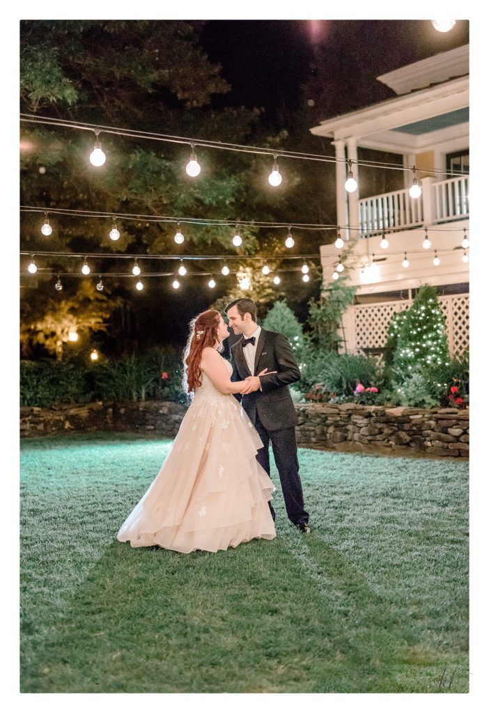 Night time portrait of a bride and groom at the Bedford Village Inn courtyard using off camera flash. 