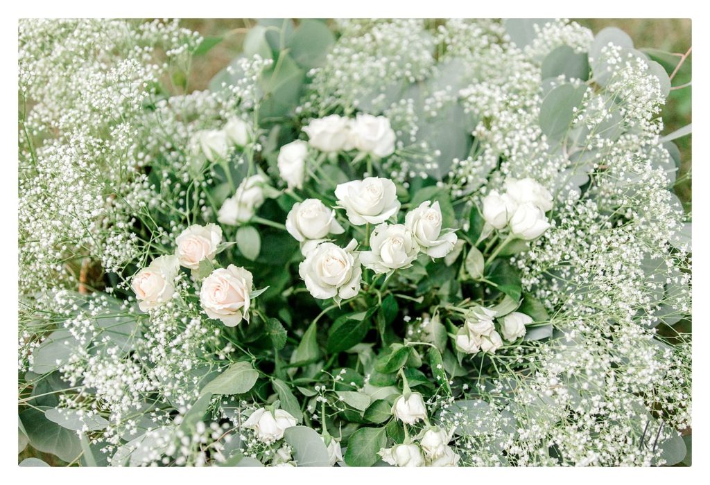 White Roses and baby's breath. 