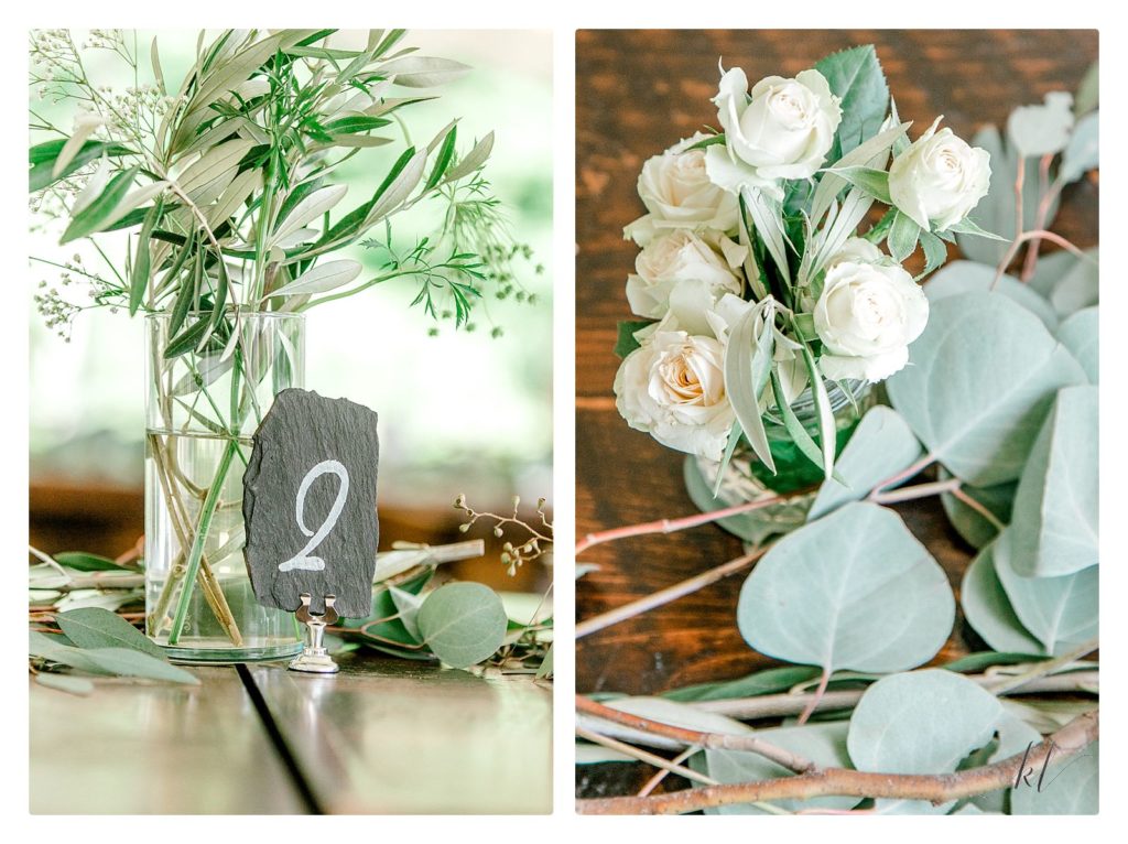 Simple backyard wedding reception centerpieces showing lots of greenery and small white roses. 