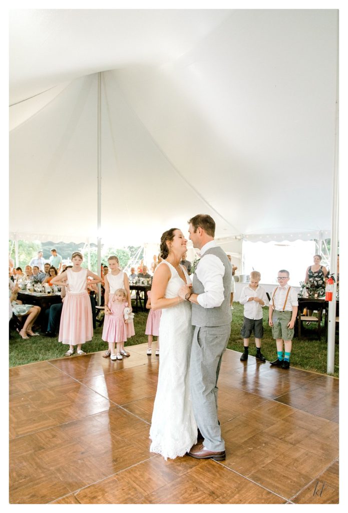 Bride and Groom's first dance under the tent during their wedding reception