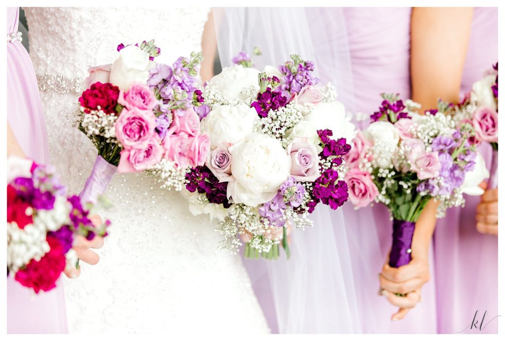 Close up of floral bouquets with pink, purple, white flowers for a Keene NH Wedding. 