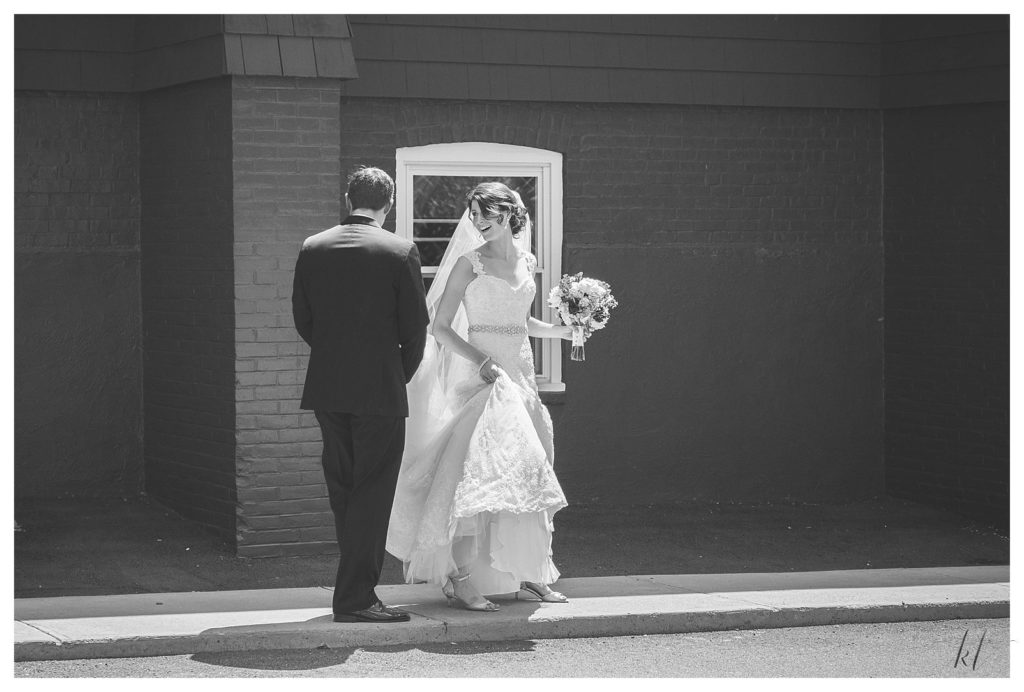 Black and White Candid Photo of a bride and groom after their Summer wedding in Keene NH. 