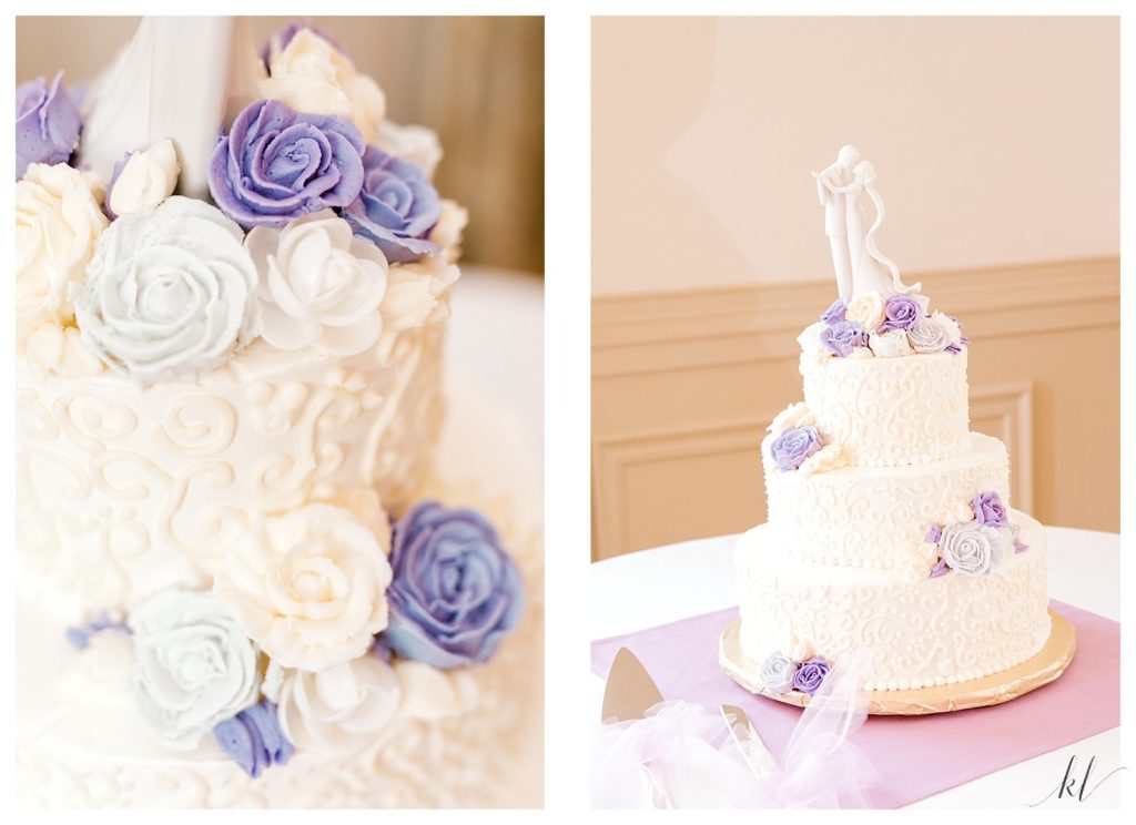 White decorative wedding cake with purple frosted flowers sits on a table at the Keene Country Club summer wedding reception. 