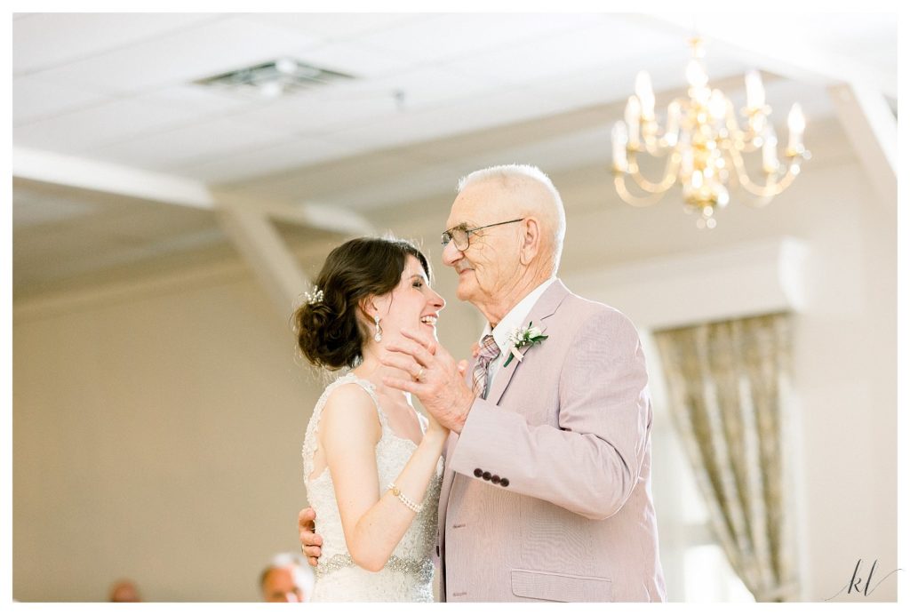 Light and Airy photo of a bride dancing with her grandfather on her wedding day at the Keene Country Club. 