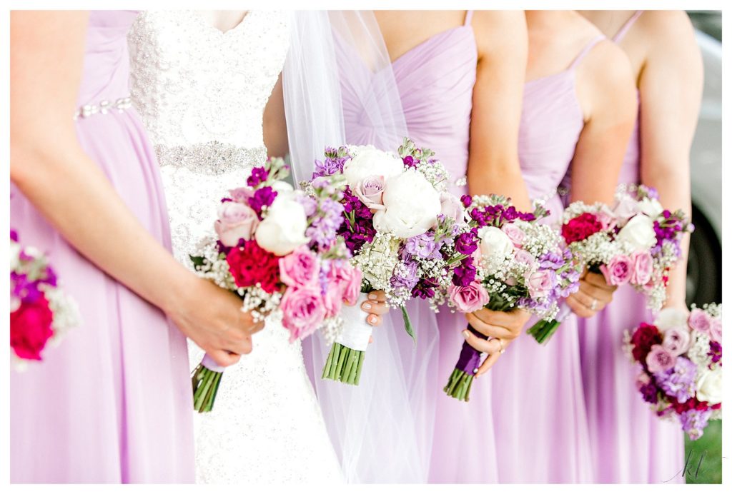 Colorful bridal bouquets showing pink, purple, white flowers and baby's breath. 