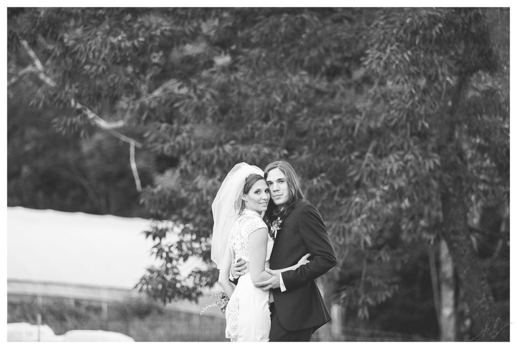 Formal Black and white portrait of a bride and groom on their wedding day at Mayfair Farm