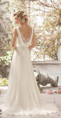 boho style wedding gown with an empire waist. 