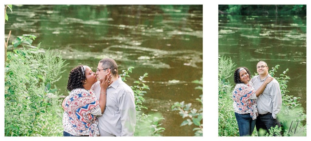 Man and Woman Kiss with a river in the background- during their Alpine Grove Engagement Session | Hollis NH - 