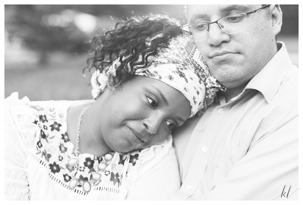 Close up of a man and woman cuddling. Black and white photo