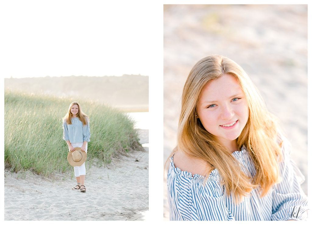 Drake's Island Senior Photos of a girl wearing white capris,  blue and white striped shirt and holding a straw hat. 
