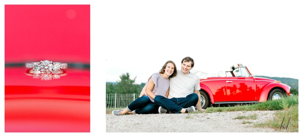 Engaged Couple sit down together in front of their 1972 Red VW Beetle. 