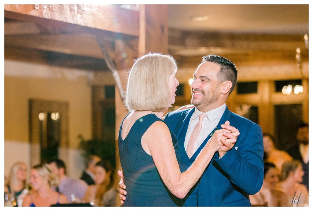 Groom dances with his mom during his wedding reception at the bedford village inn. 
