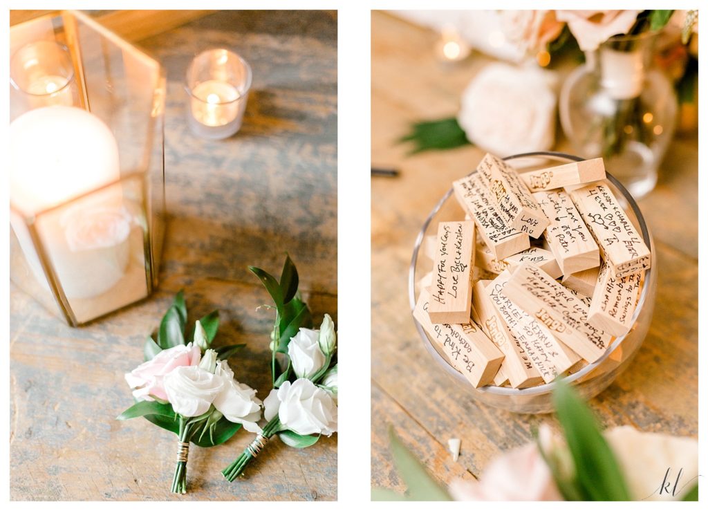 Rustic table with white floral boutonnieres and Jenga pieces. 