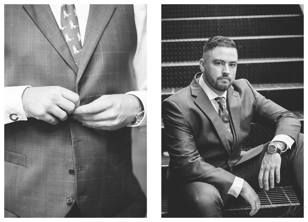 Black and white groom portrait sitting on stairs and buttoning his vest. 