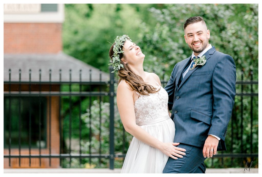 Candid and silly moment captured of a bride and groom on their wedding day. 