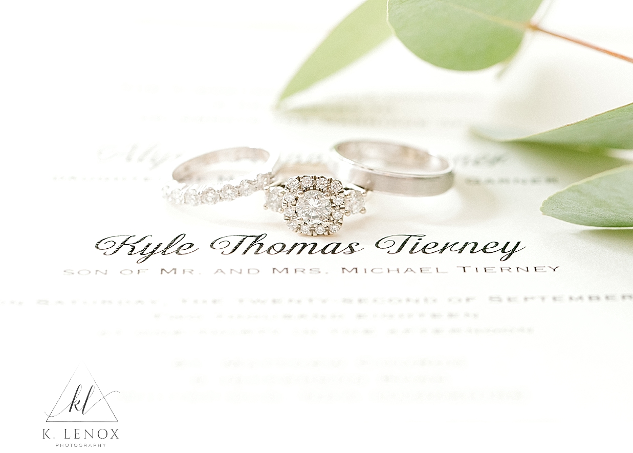 White Wedding Invitation with three white gold rings and a diamond