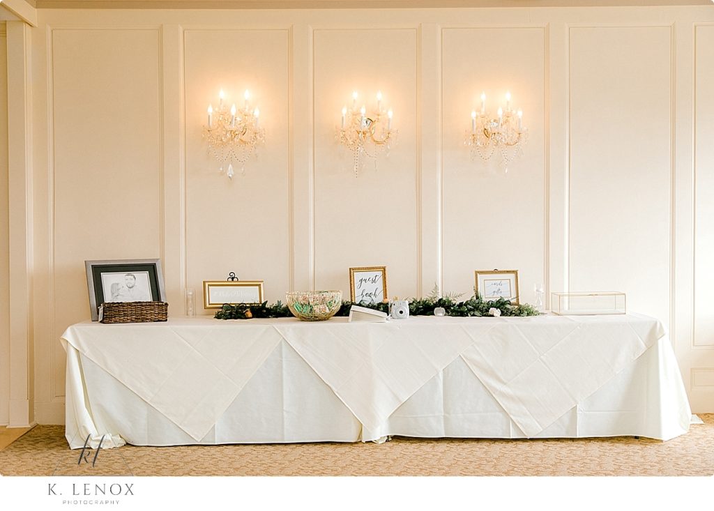 Card and guest book table at the Mountain View Grand Wedding Reception- Cream tablecloths and gold frames. 