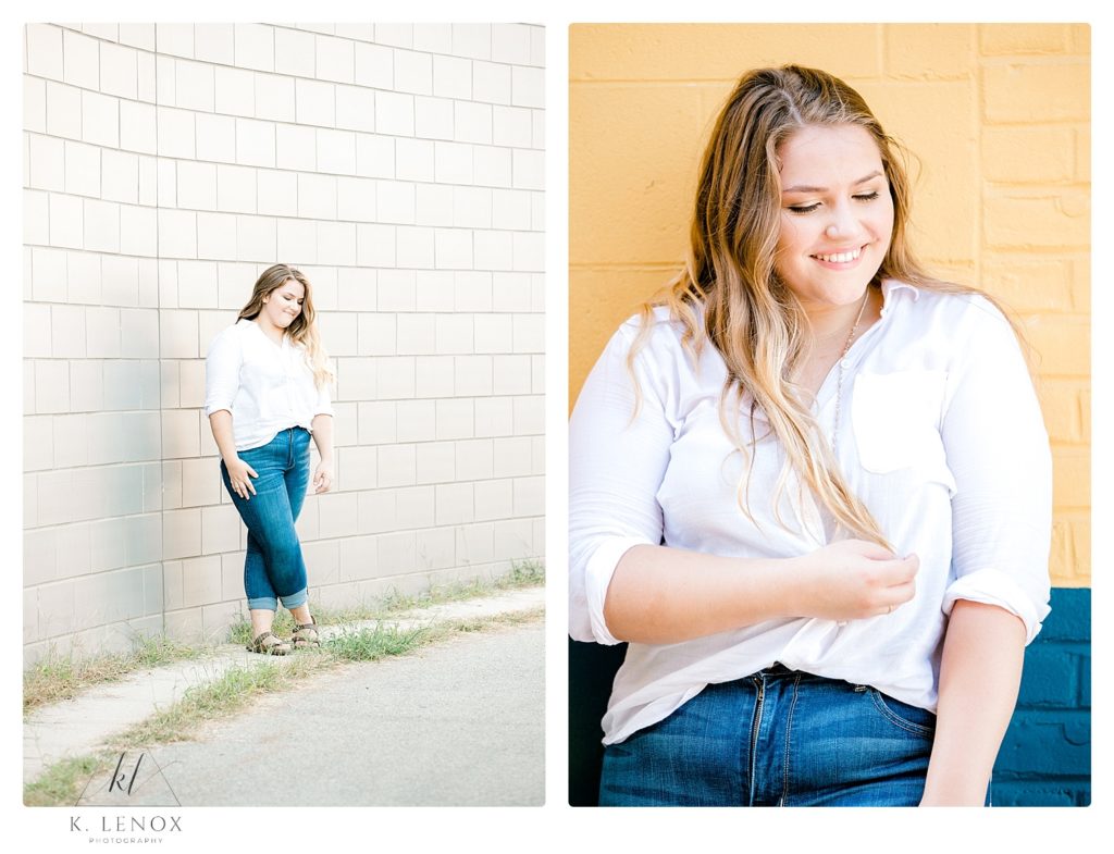 High school senior portrait of a girl wearing a white button down shirt and blue jeans. 