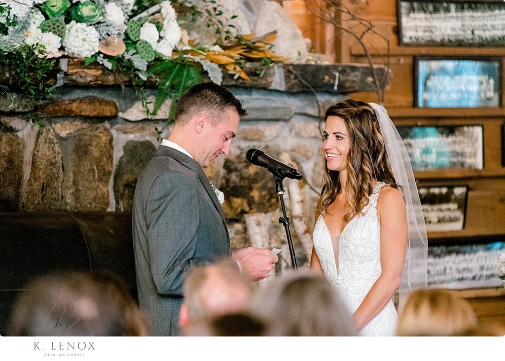 Groom reads his vows at a Rustic Wedding at Camp Takodah in Rindge NH. 