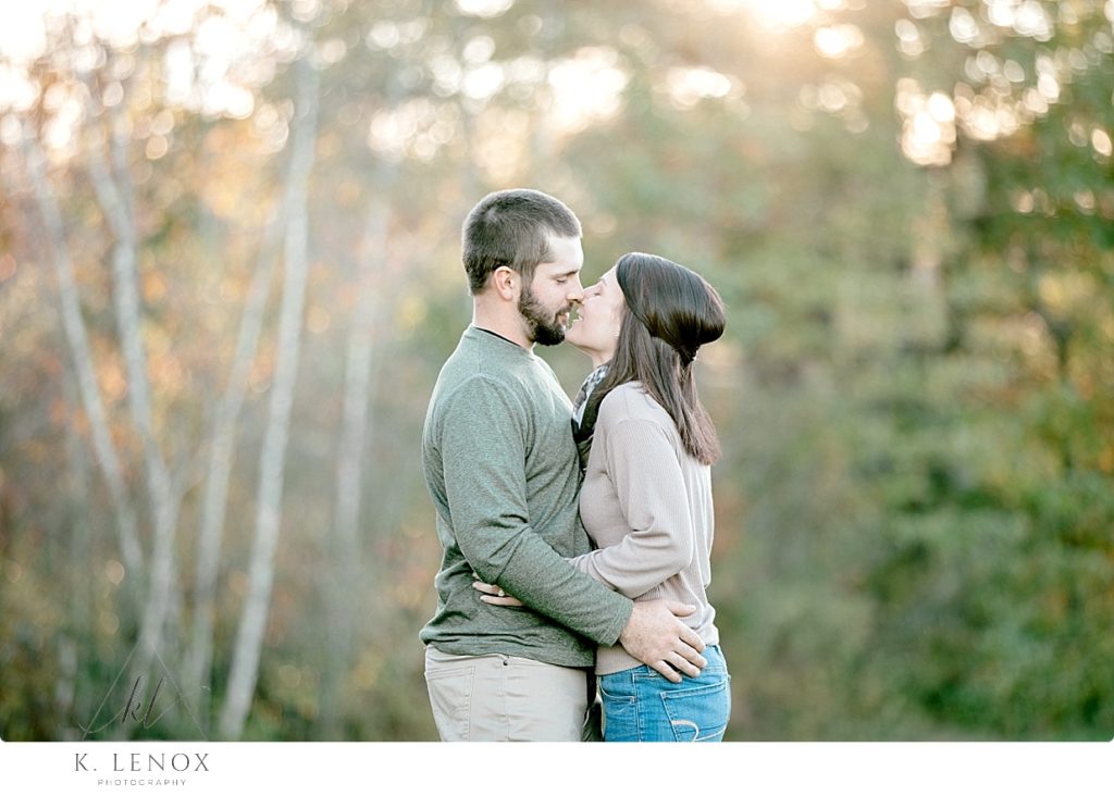 Engagement Session at the Grand View Estate- man and woman kissing. 