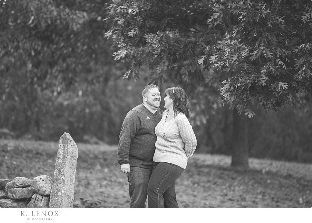 Candid and Natural photo of a couple in love while visiting the Path of life garden in VT. 