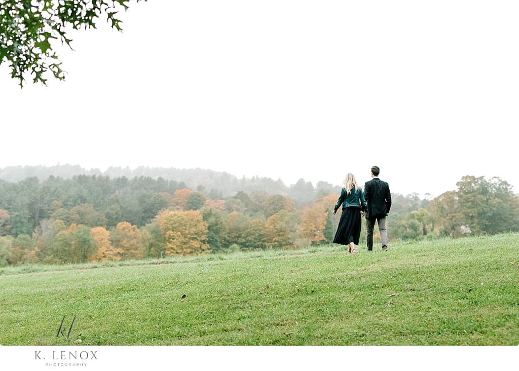 Engagement Photo showing the Autumn foliage on a foggy and cloudy afternoon. 
