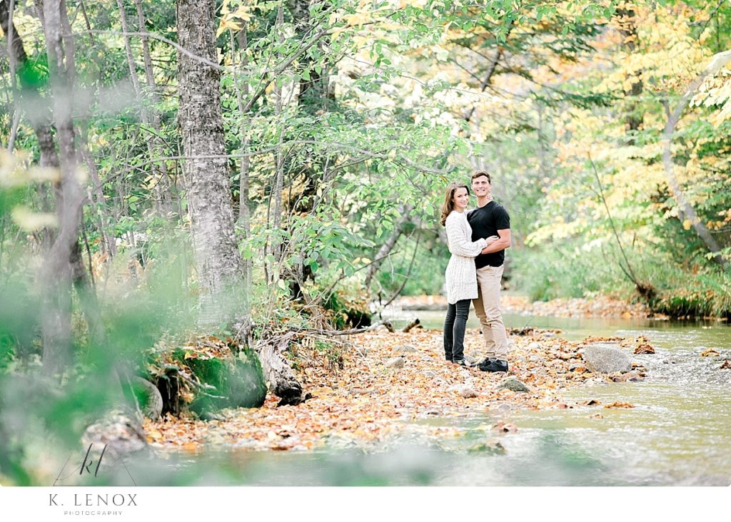 Light and Airy Engagement Photos in the White Mountains of NH- taken near a stream in the FALL