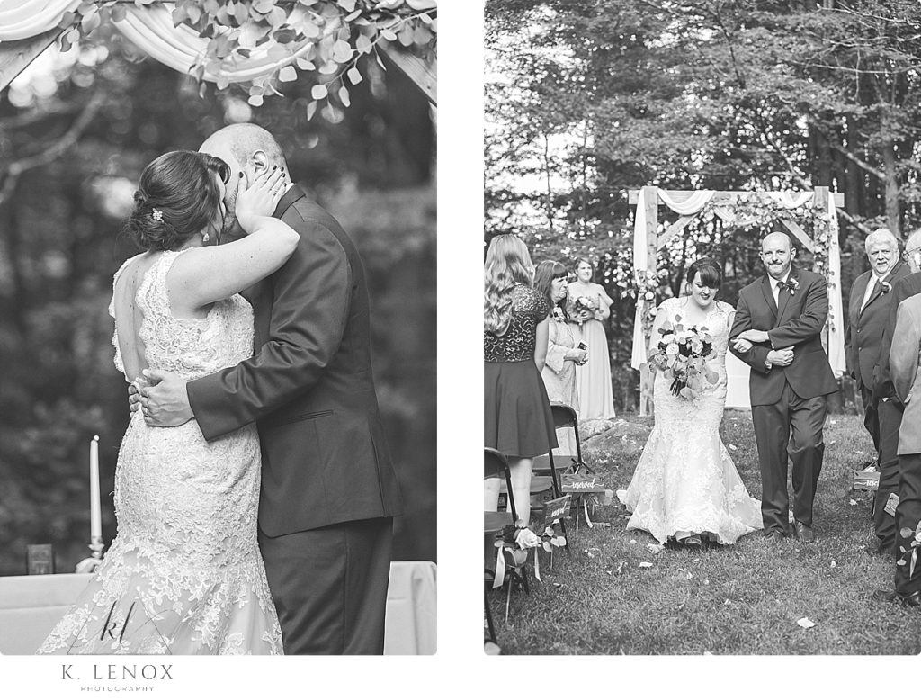 Black and White photos of the Bride and Groom having their first kiss during the wedding ceremony at Stonewall Farm. 