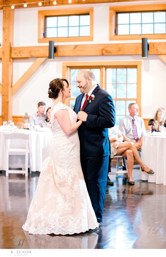 Bride and Groom dancing their first dance at stonewall farm in Keene NH. 