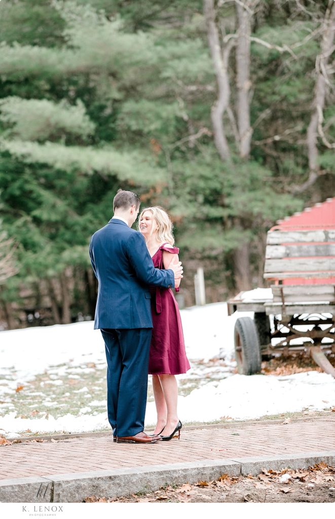 Man and woman share a special moment at Stonewall Farm for their Light and Airy photo session. 