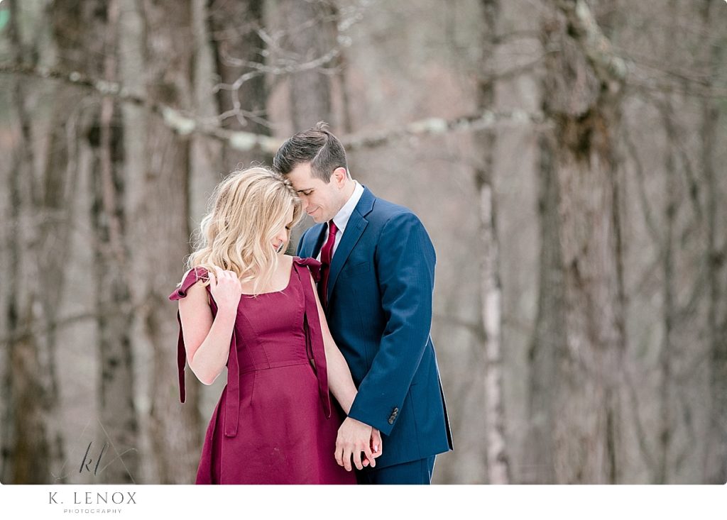 Maroon Dress: Christian Siriano Blue Suite: Ted Baker Light and airy engagement session