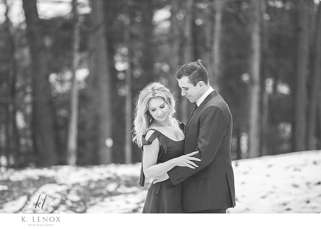 Black and white image of an engaged couple at Stonewall farm in Keene. Taken by K. Lenox Photography