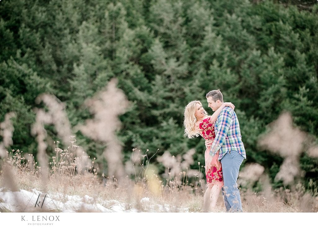Candid and Authentic photo taken at an Light & Airy Winter Engagement Session at Stonewall Farm