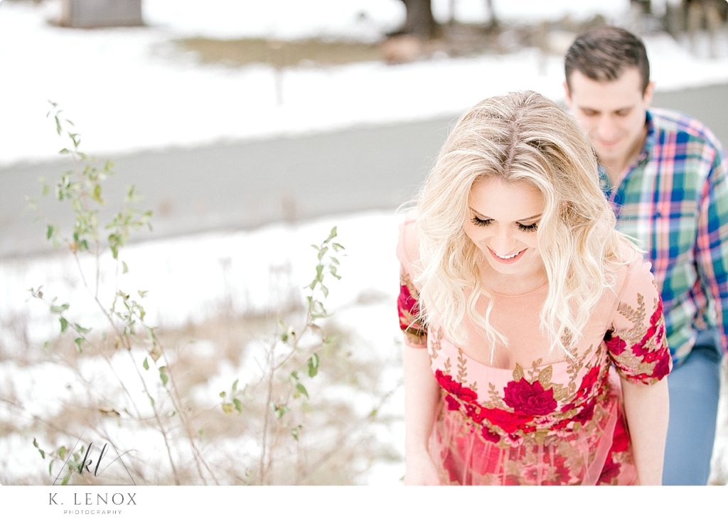 Light & Airy Winter Candid photo of an engaged couple at Stonewall Farm
