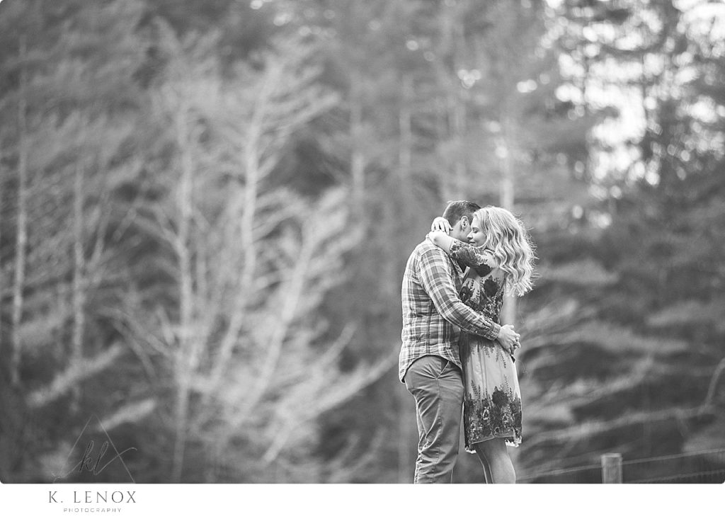 Light & Airy Winter Engagement Session at Stonewall Farm- Black and White Photo of a man and woman